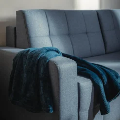 Sofa rozkładana z pikowaniem niebieska LILA